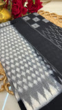 Close-up of black and grey Ikkat cotton handloom saree