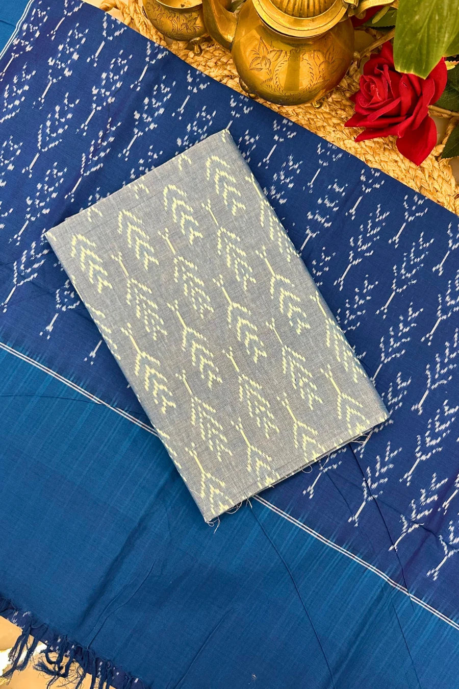 Blue and grey Ikkat cotton suit set with handwoven kurta fabric, matching dupatta and bottom in traditional resist-dyed patterns.