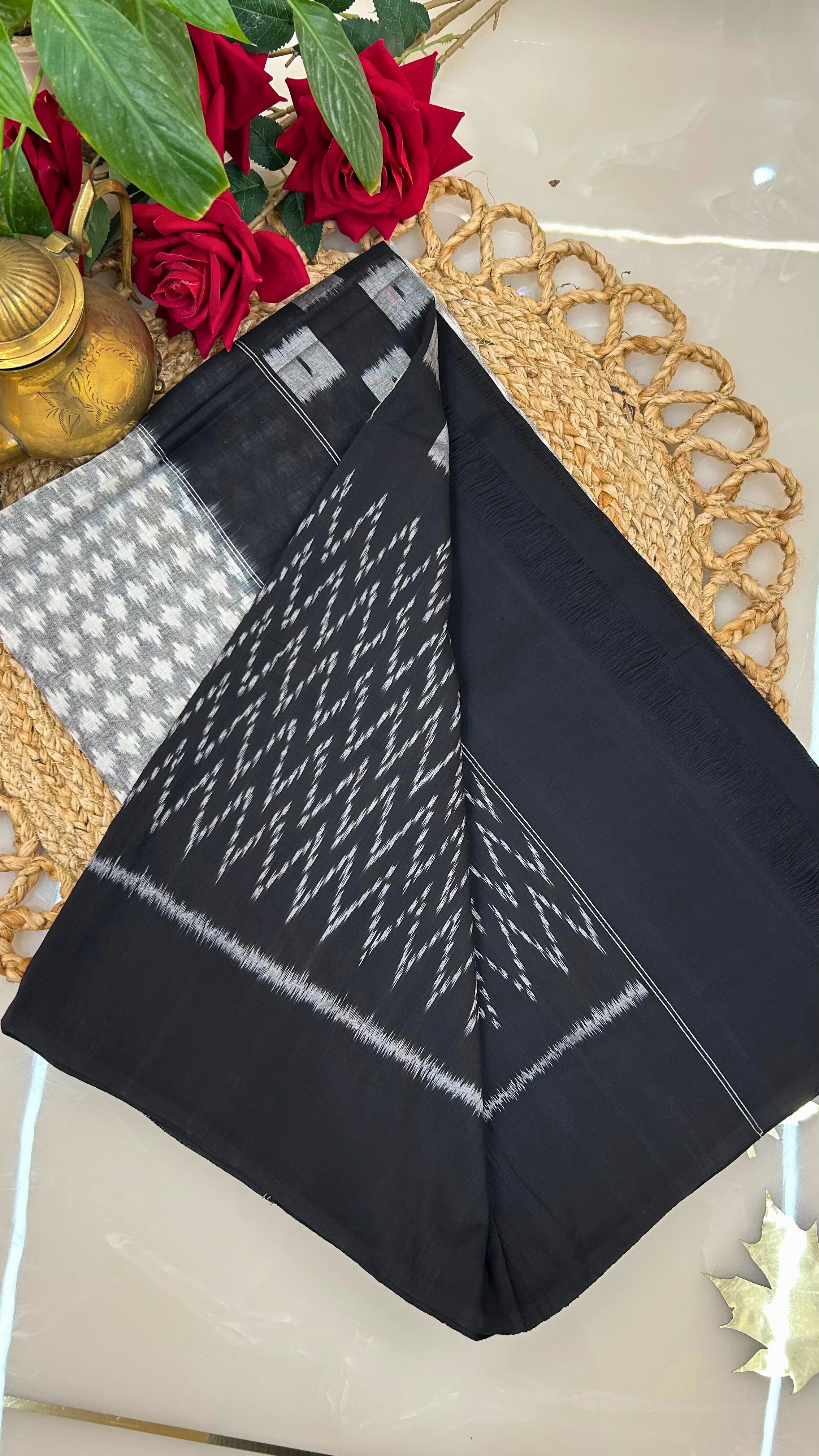 Grey and black Ikkat cotton saree pallu with traditional geometric patterns